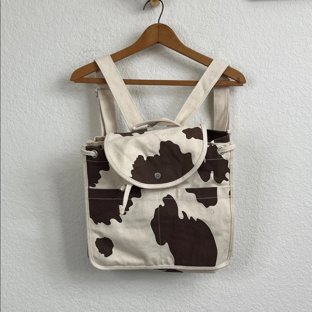 BAGGU Canvas Cow Print Backpack in Cream and Brown